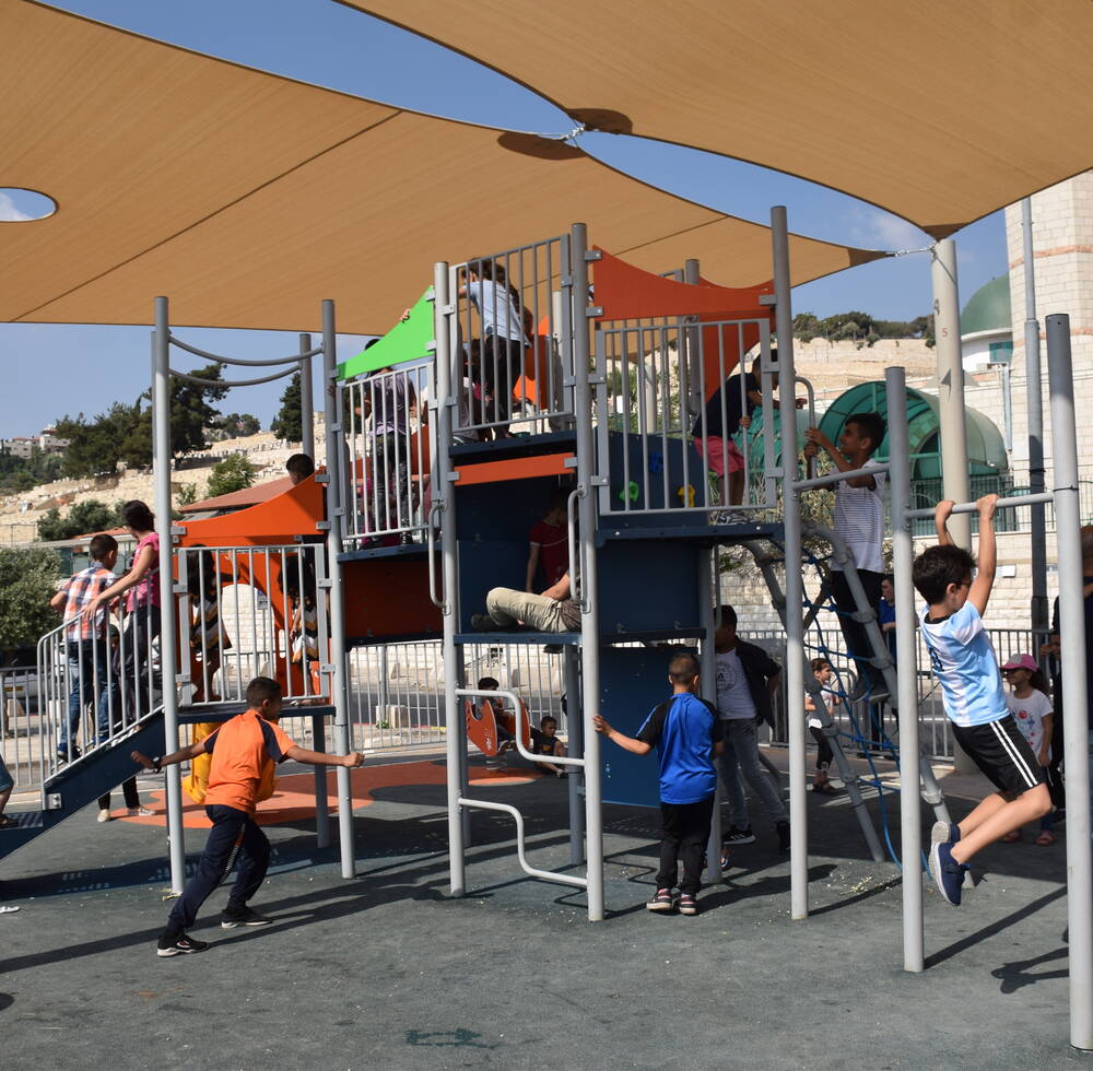Children playing in the new playground in East Jerusalem [Photo/UN-Habitat]