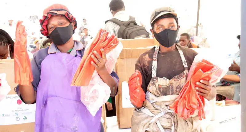 Hundreds of masks and gloves distributed to waste pickers in Nairobi dumpsite under Japan supported project